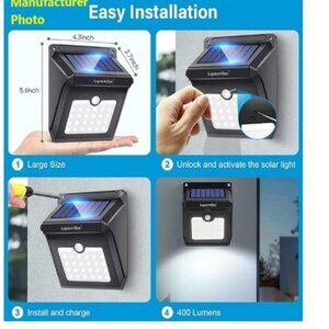 NIB - 4 pack - Outdoor, Solar, Motion Sensor, Wireless Waterproof Wall Lights